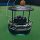 Das Titelbild des Beitrages zeigt einen Roboter, der für den größten Technik-Schülerwettbewerb RoboCupJunior entwikelt wurde und dort im Bereich "Soccer" antritt. Entwickelt wurde der Roboter von Schüler:innen des Lessing Gymnasiums in Neu-Ulm.