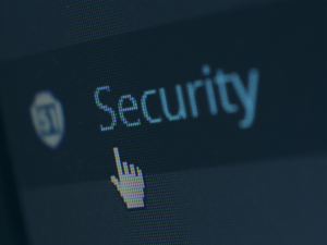 Close-up eines Bildschirms mit dem Wort 'Security' und einem zeigenden Cursor – Beitragsbild das auf einen Blogbeitrag zur OWASP Security Checklist verlinkt.